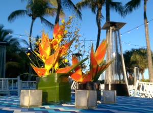Tropical Duo orange heliconia and orchid w- capiz votives on blue chevron
