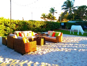 furniture groupings with fire pit at Surfcomber Hotel, South Beach